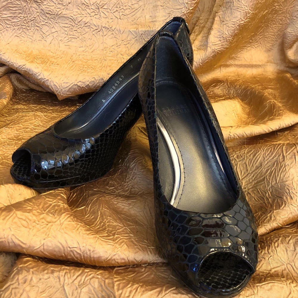Stuart Weitzman navy snakeskin peep toe pumps